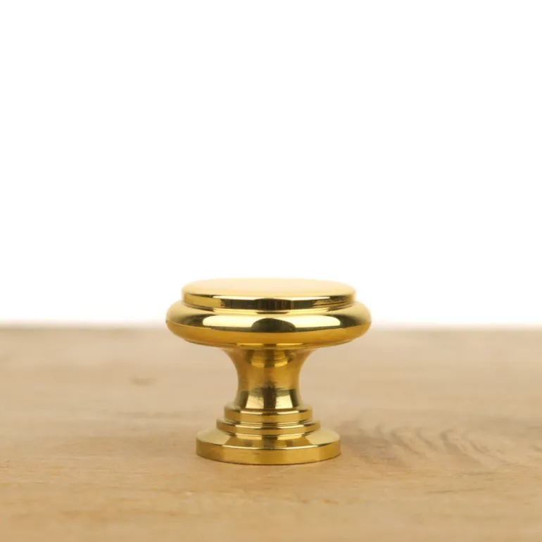 Bouton de meuble plat laiton poli