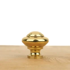 Bouton de meuble tête bombée laiton poli