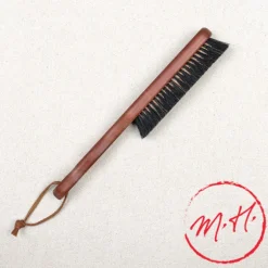 Brosse à vêtements à fils de bronze
