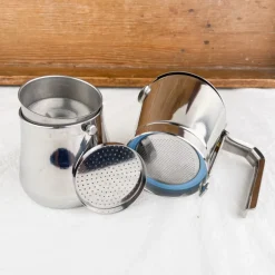Cafetière italienne avec fermeture par rotation de la poignée