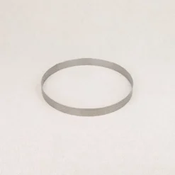 Cercle à tarte perforé en inox De Buyer
