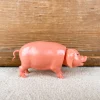 Cochon qui hoche la tête
