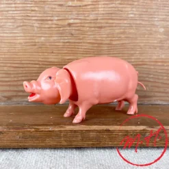 Cochon qui hoche la tête