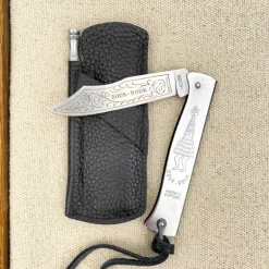 Douk Douk et son étui de cuir