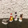 4 fèves santons en porcelaine