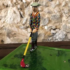 Golfeur mécanique en tôle