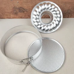Moule à manqué démontable à 2 fonds en fer blanc