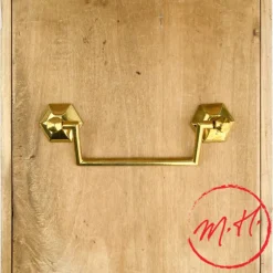 Poignée de meuble Louis XVI en laiton poli