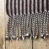 Poncho rayé en laine couleur chocolat/marron foncé