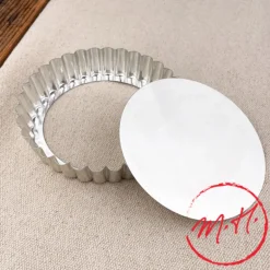 Tartelette en fer blanc à fond mobile