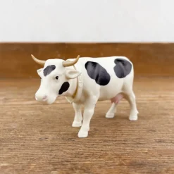 Vache qui hoche la tête