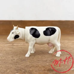 Vache qui hoche la tête