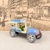 Voiture limousine beige et bleue mécanique