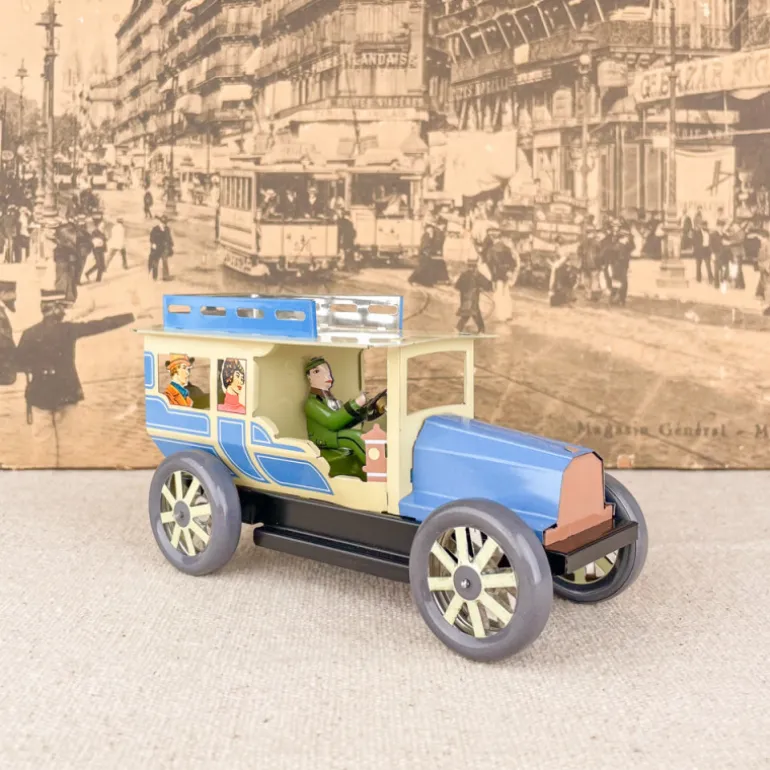 Voiture limousine beige et bleue mécanique