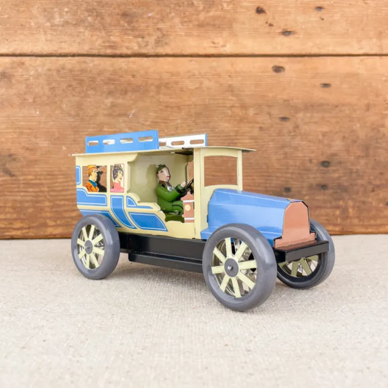 Voiture limousine beige et bleue mécanique