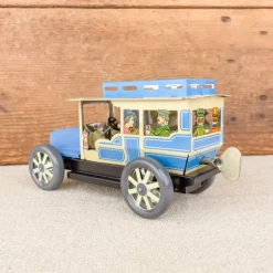 Voiture limousine beige et bleue mécanique