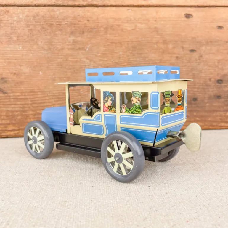 Voiture limousine beige et bleue mécanique