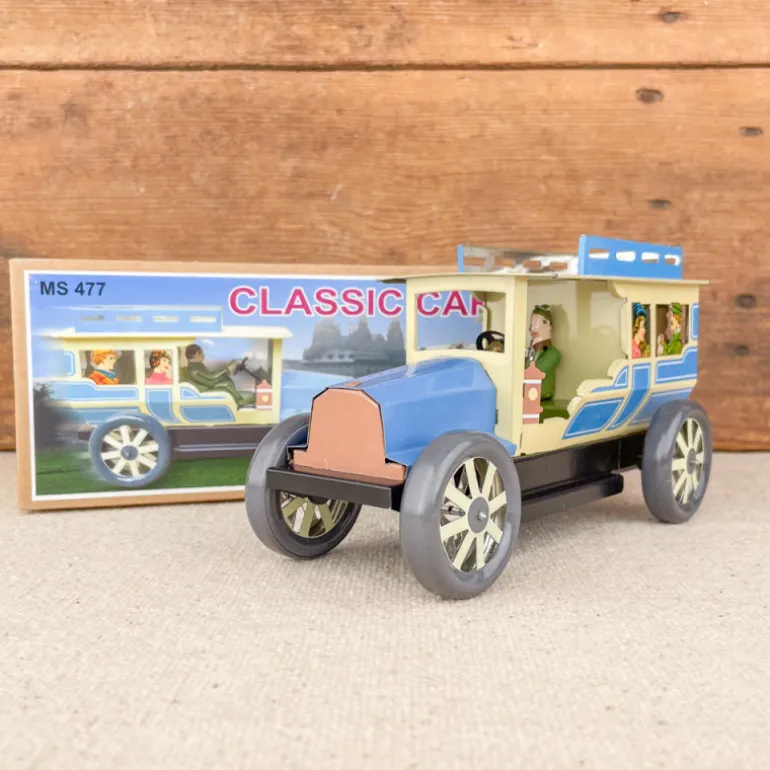 Voiture limousine beige et bleue mécanique