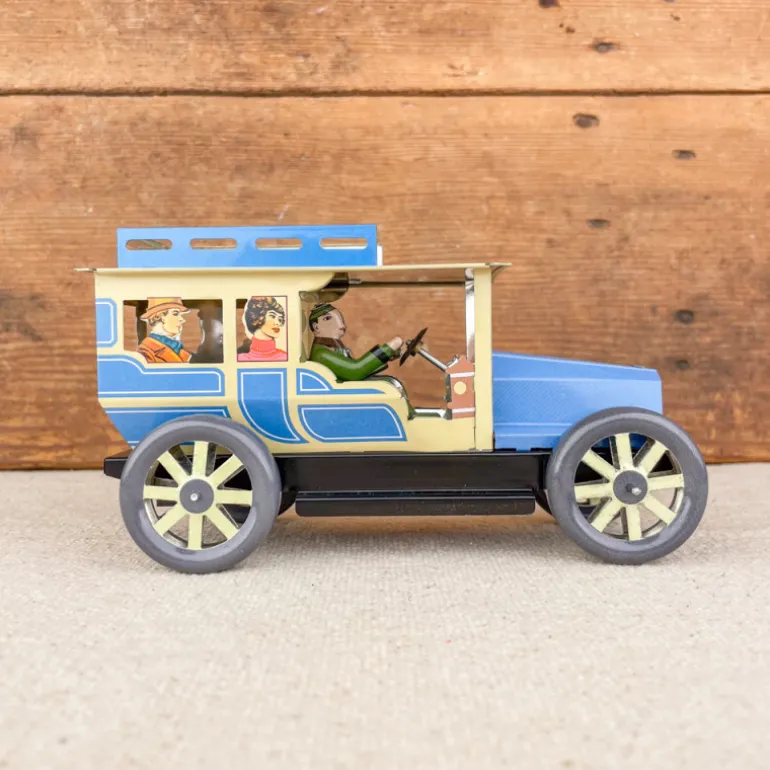Voiture limousine beige et bleue mécanique
